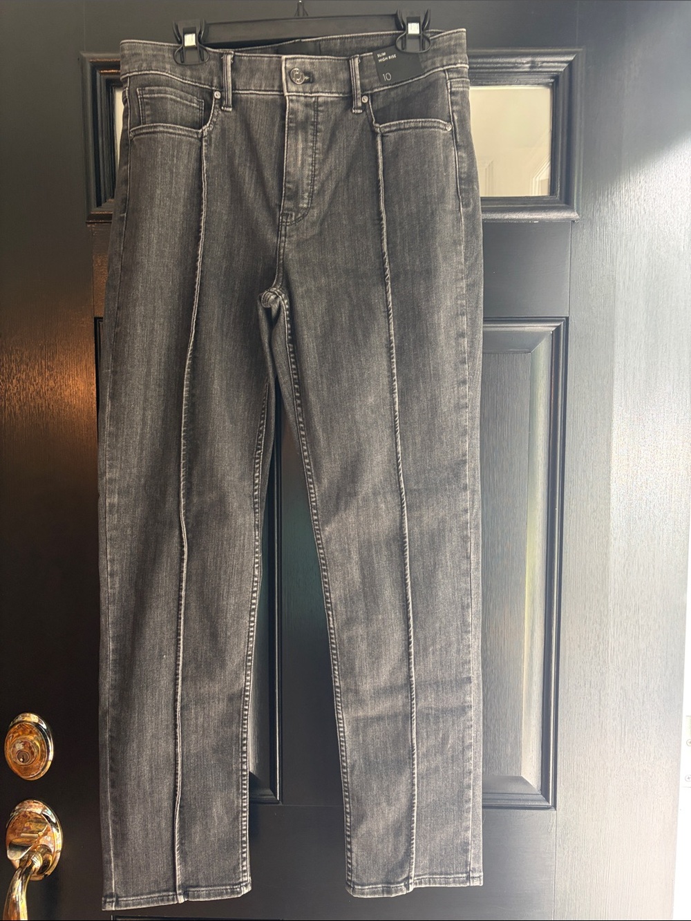 WHBM Women’s black light washed Seam-Front Jeans. Slim high rise.